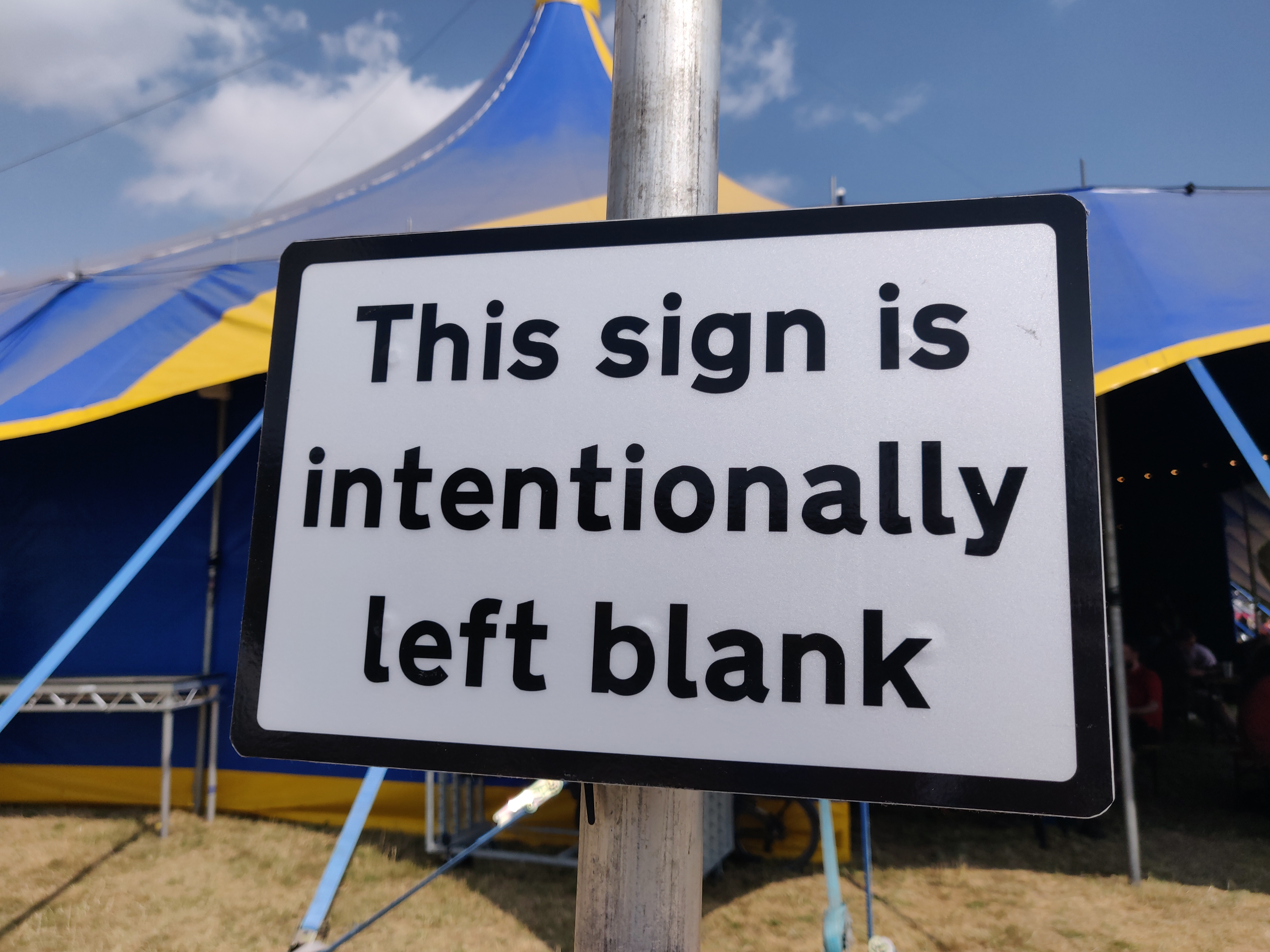 A sign saying "This sign is intentionally left blank"